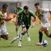 Paraguay's Guarani Brazilian Rodi Ferreira (L) and Brazil's America MG Marlon (C) vie for the ball during their Copa Libertadores football match at the Independencia stadium in Belo Horizonte, Brazil, on February 23, 2022. (Photo by DOUGLAS MAGNO / AFP) (Photo by DOUGLAS MAGNO/AFP via Getty Images)